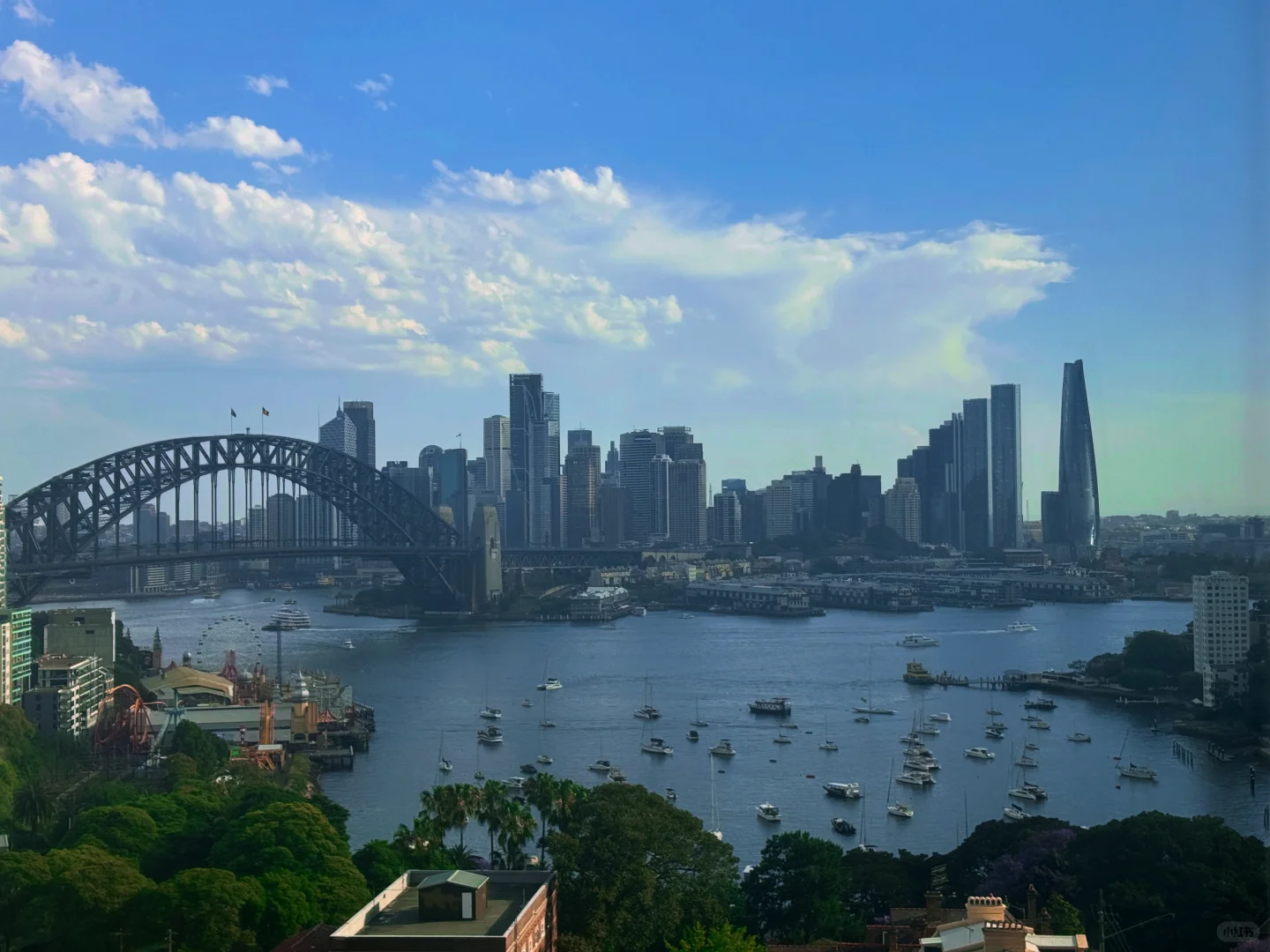 We stayed in a corner room on the 21st floor with beautiful sea views through curved glass at Citadines Walker North Sydney.